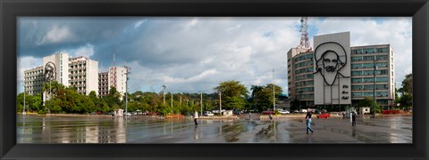 Framed Metal sculptures of Camilo Cienfuegos and Che Guevara on two buildings, Revolutionary Square, Vedado, Havana, Cuba Print