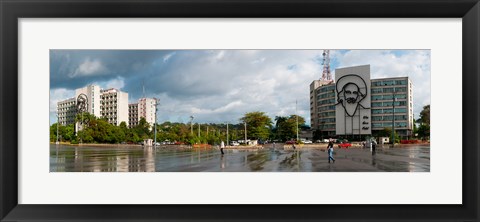 Framed Metal sculptures of Camilo Cienfuegos and Che Guevara on two buildings, Revolutionary Square, Vedado, Havana, Cuba Print