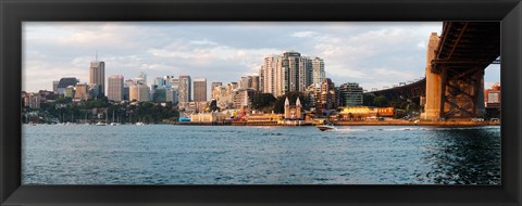 Framed Skyscrapers at the waterfront, McMahons Point, Sydney Harbor Bridge, Sydney Harbor, Sydney, New South Wales, Australia 2012 Print