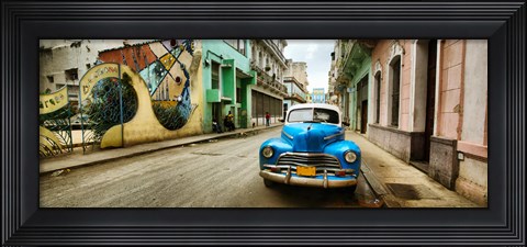 Framed Old car and a mural on a street, Havana, Cuba Print