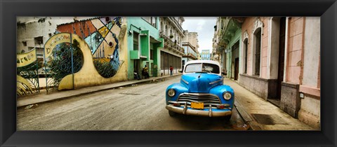 Framed Old car and a mural on a street, Havana, Cuba Print