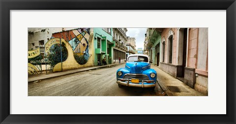 Framed Old car and a mural on a street, Havana, Cuba Print