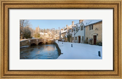 Framed Buildings along snow covered street, Castle Combe, Wiltshire, England Print