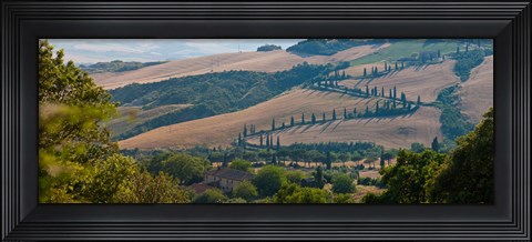 Framed High angle view of winding road in valley, Tuscany, Italy Print