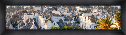 Framed High angle view of trulli houses in town of Alberobello, Bari Province, Puglia, Italy Print
