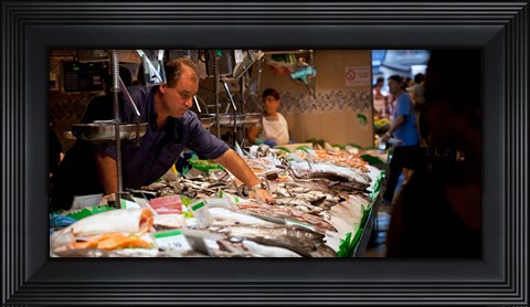 Framed Fishmonger at a fish stall, La Boqueria Market, Ciutat Vella, Barcelona, Catalonia, Spain Print
