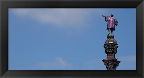 Framed Low angle view of a monument, Columbus Monument wearing soccer jersey, Barcelona, Catalonia, Spain Print