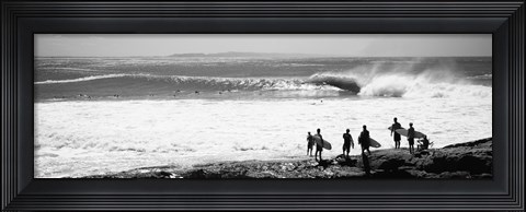 Framed Silhouette of surfers standing on the beach, Australia (black and white) Print