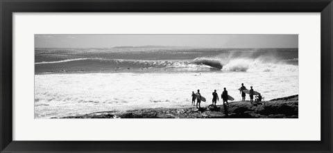 Framed Silhouette of surfers standing on the beach, Australia (black and white) Print