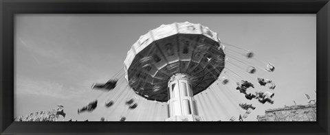 Framed Low angle view of people spinning on a carousel, Stuttgart, Baden-Wurttemberg, Germany Print