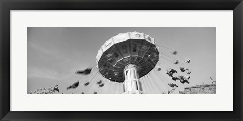 Framed Low angle view of people spinning on a carousel, Stuttgart, Baden-Wurttemberg, Germany Print