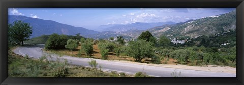 Framed Road passing through a landscape with mountains in the background, Andalucian Sierra Nevada, Andalusia, Spain Print