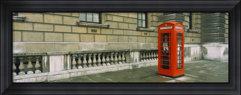 Framed Telephone booth at the roadside, London, England Print
