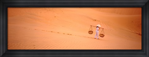 Framed Woman carrying panniers, Mui Ne, Vietnam Print