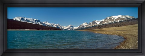 Framed Lake with snow covered mountains in the background, Sherburne Lake, US Glacier National Park, Montana, USA Print