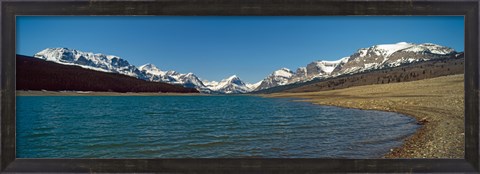 Framed Lake with snow covered mountains in the background, Sherburne Lake, US Glacier National Park, Montana, USA Print