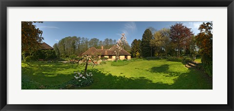Framed Millstream cottages, Egerton, Kent, England Print