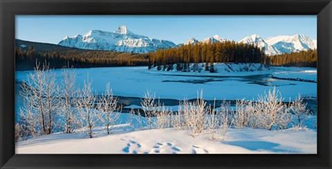 Framed Frozen river with mountain range in the background, Mt Fryatt, Athabaska River, Jasper National Park, Alberta, Canada Print