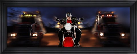 Framed Motorcycle rider between two semi trucks Print