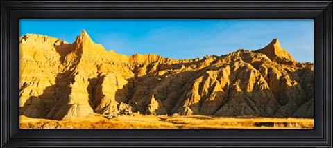 Framed Sculpted sandstone spires on a landscape, Saddle Pass Trail, Badlands National Park, South Dakota, USA Print