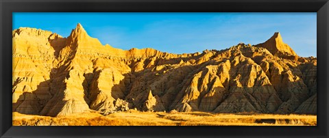 Framed Sculpted sandstone spires on a landscape, Saddle Pass Trail, Badlands National Park, South Dakota, USA Print