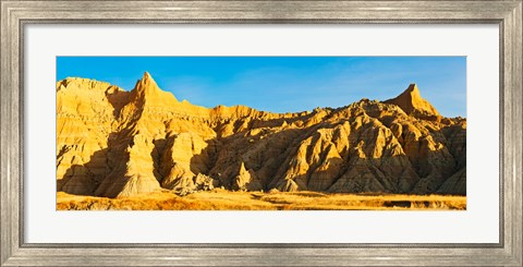 Framed Sculpted sandstone spires on a landscape, Saddle Pass Trail, Badlands National Park, South Dakota, USA Print