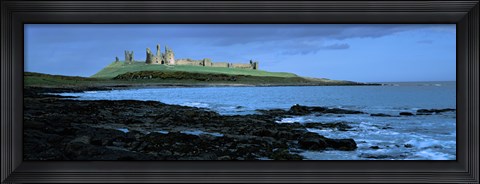 Framed Dunstanburgh Castle at the coast, Northumberland, England Print