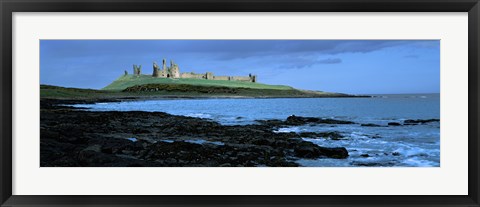 Framed Dunstanburgh Castle at the coast, Northumberland, England Print