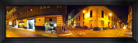 Framed Shops along a street at night, Lima, Peru Print