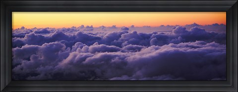 Framed Sunset above the clouds Print