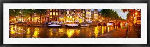 Framed Buildings along a canal at dusk, Amsterdam, Netherlands Print