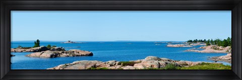 Framed Rock formations in a lake, Killarney, Georgian Bay, Ontario, Canada Print