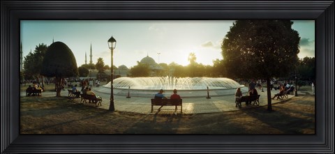 Framed People sitting at a fountain with Blue Mosque in the background, Istanbul, Turkey Print