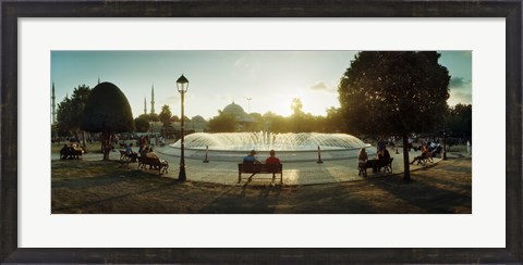Framed People sitting at a fountain with Blue Mosque in the background, Istanbul, Turkey Print