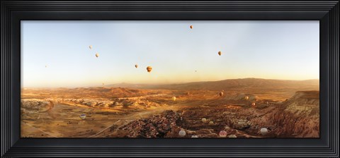 Framed Hot air balloons over a village in Cappadocia, Central Anatolia Region, Turkey Print