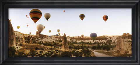 Framed Hot air balloons over landscape at sunrise, Cappadocia, Central Anatolia Region, Turkey Print