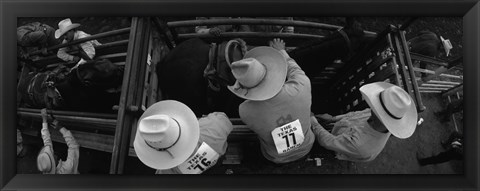 Framed High angle view of cowboys with horses at rodeo, Wichita Falls, Texas, USA Print