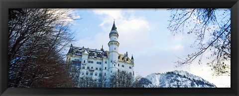 Framed Low angle view of the Neuschwanstein Castle in winter, Bavaria, Germany Print