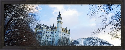 Framed Low angle view of the Neuschwanstein Castle in winter, Bavaria, Germany Print