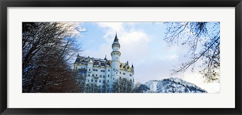 Framed Low angle view of the Neuschwanstein Castle in winter, Bavaria, Germany Print