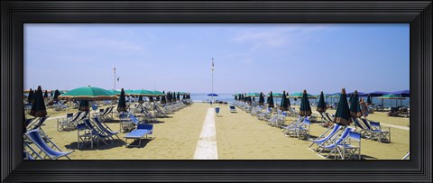 Framed Deck chairs and umbrellas on the beach, Viareggio, Tuscany, Italy Print