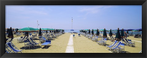 Framed Deck chairs and umbrellas on the beach, Viareggio, Tuscany, Italy Print