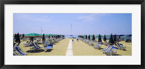 Framed Deck chairs and umbrellas on the beach, Viareggio, Tuscany, Italy Print