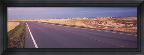 Framed Road passing through the Badlands National Park, South Dakota Print