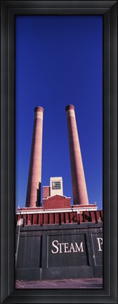 Framed Low angle view of two smoke stacks at Steam Plant Square, Spokane, Washington State Print