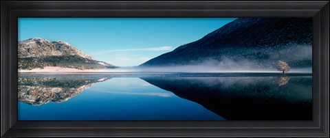 Framed Reflection of a mountain with snowy trees on a lake in winter afternoon, Cote d&#39;Azur, France Print