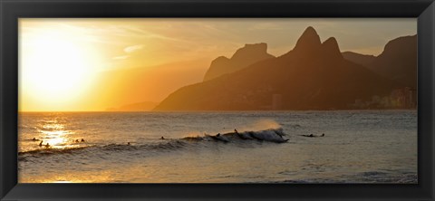 Framed Surfers at sunset on Ipanema Beach, Rio De Janeiro, Brazil Print