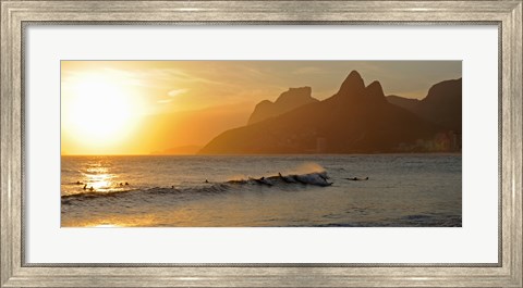 Framed Surfers at sunset on Ipanema Beach, Rio De Janeiro, Brazil Print