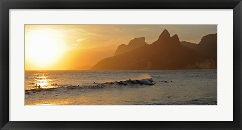 Framed Surfers at sunset on Ipanema Beach, Rio De Janeiro, Brazil Print