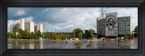 Framed Metal sculptures of Camilo Cienfuegos and Che Guevara on two buildings, Revolutionary Square, Vedado, Havana, Cuba Print